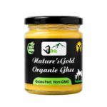 Dokos Nature's Gold Organic Ghee in a premium glass jar with black lid, displayed on a clean white background.