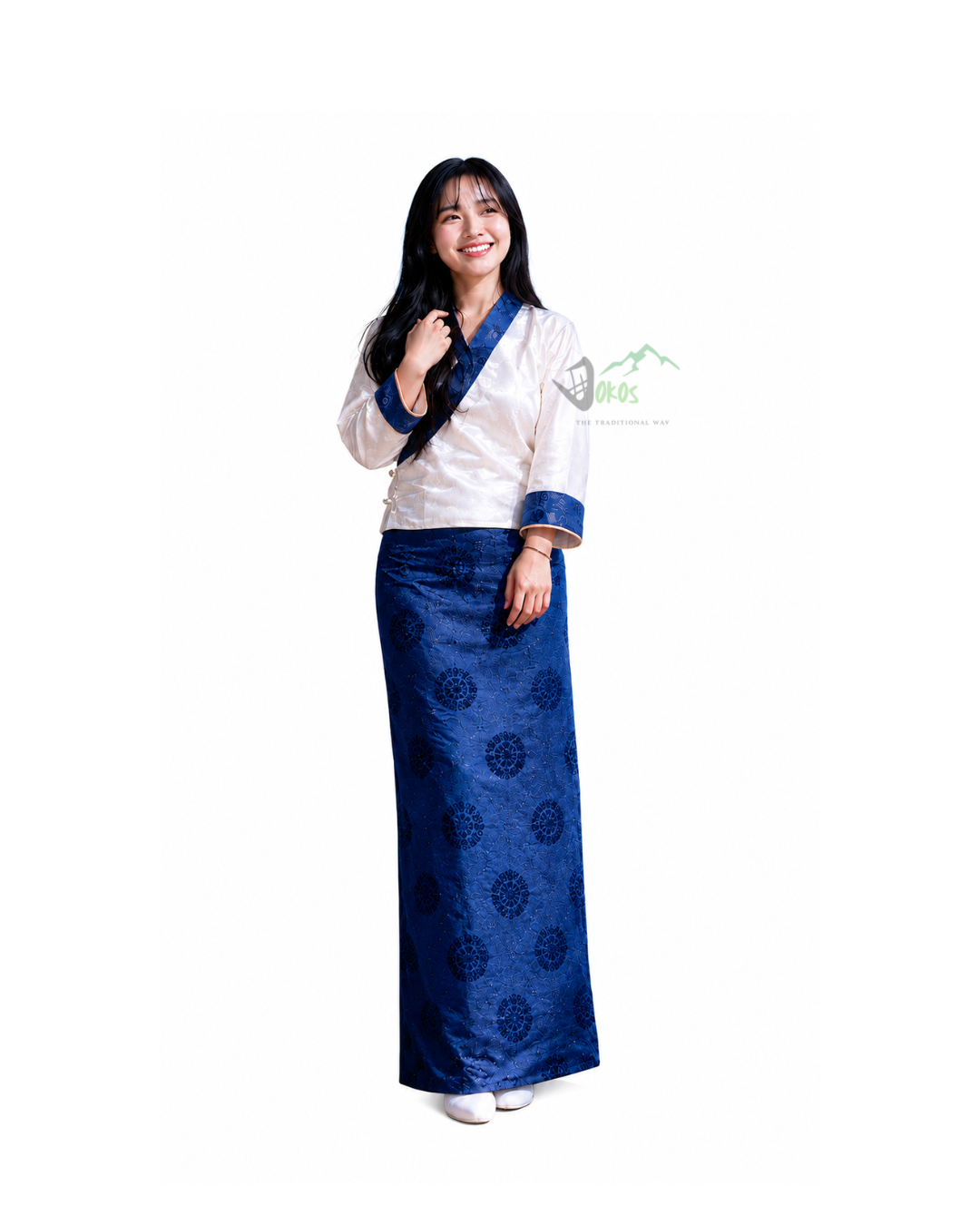 Front view of a woman wearing traditional Wanju Bhaku dress in blue and white by Dokos