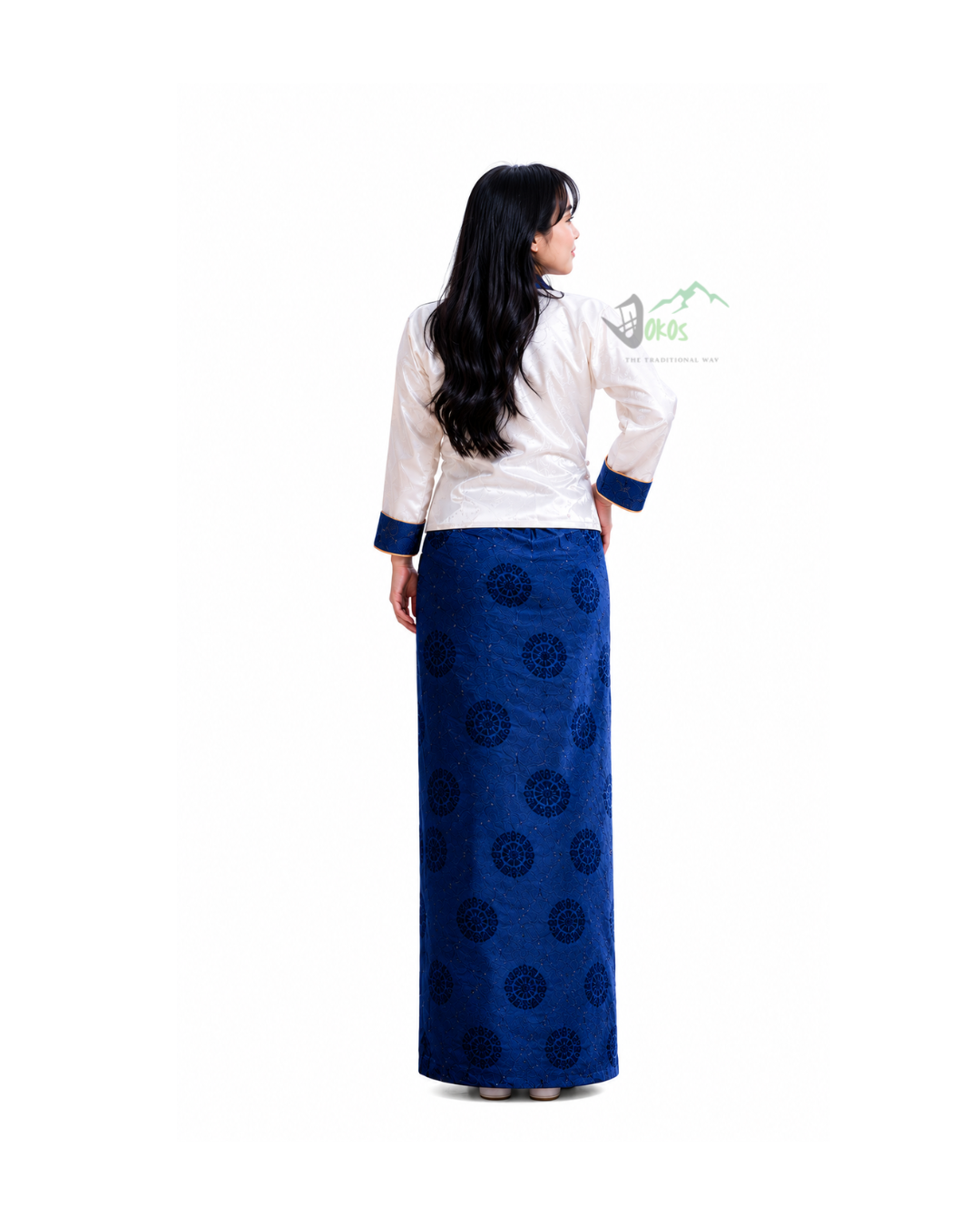 Back view of a woman wearing traditional Wanju Bhaku dress in blue and white by Dokos