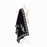 Black Gurung/Magar Ghalek traditional women's attire with gold decorative detailing.