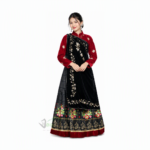 Woman wearing a traditional Gurung and Magar/Mangar dress with a black skirt, red blouse, and decorative embroidered border