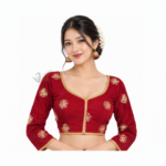 Woman wearing a red Nepali Chaubandi Cholo blouse with gold embroidery